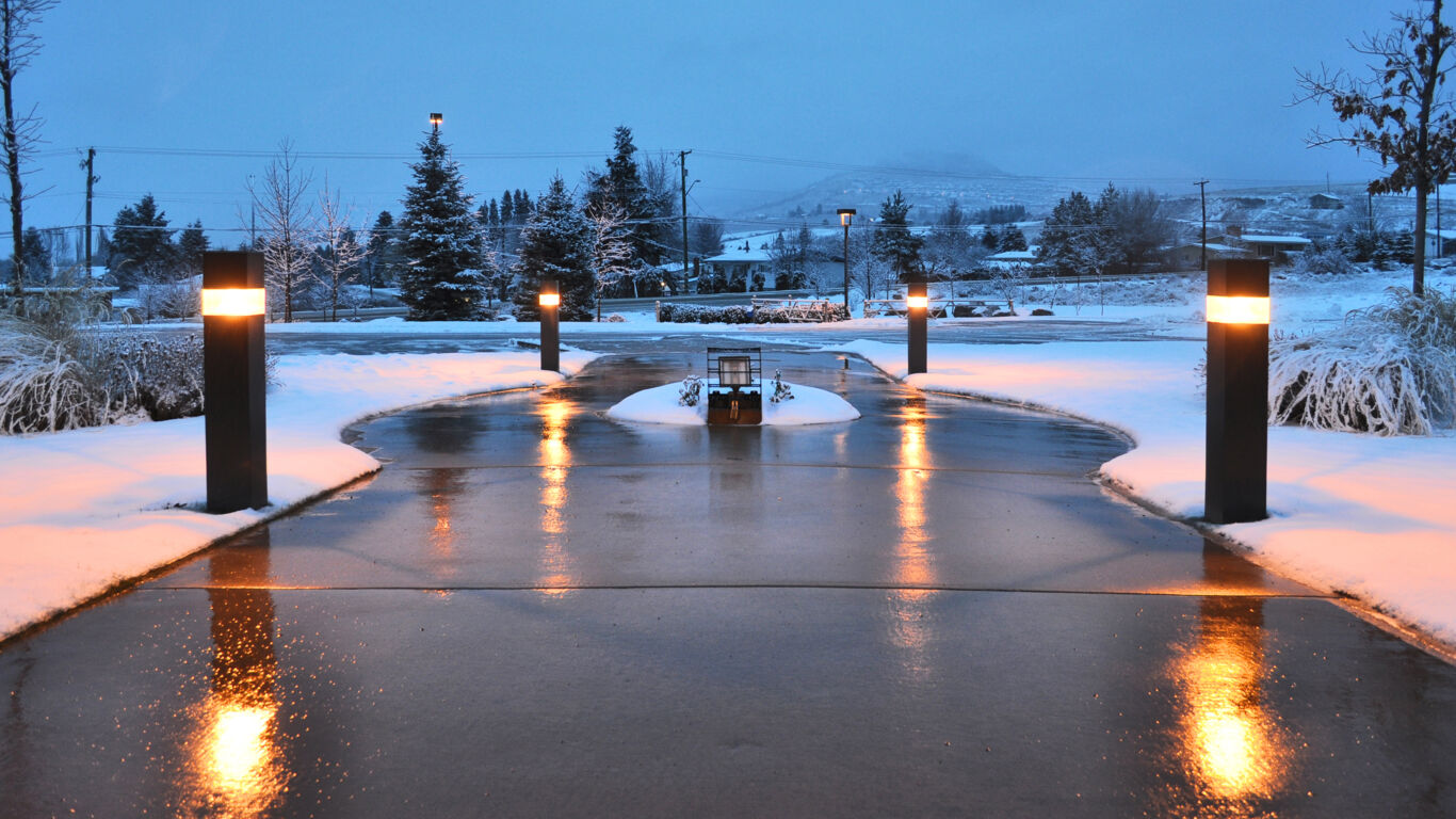 Driveway in winter with snow melted off of it.